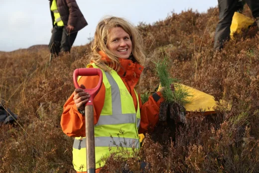 IMG 0203 Volunteer Katy with Scots pine seedlings shes about to plant