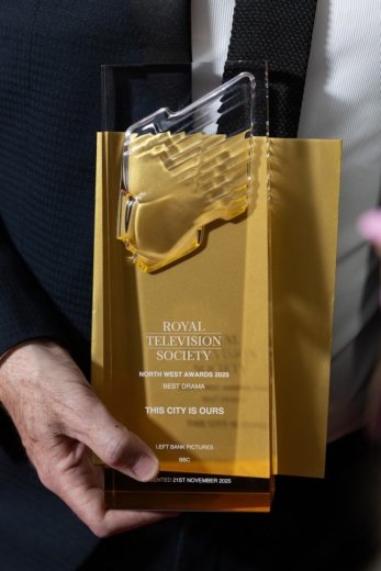 Royal Television Society North West Awards custom acrylic trophy with gold branded detail.