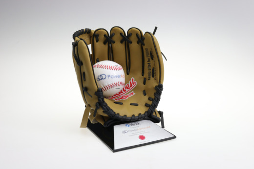 Baseball glove deal toy on a black base with metal plate