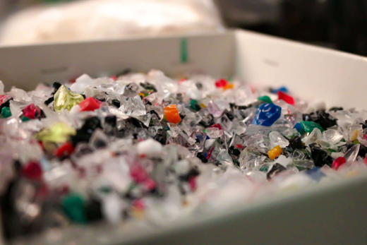 coloured acrylic chip in a white box ready for manufacturing sustainable awards