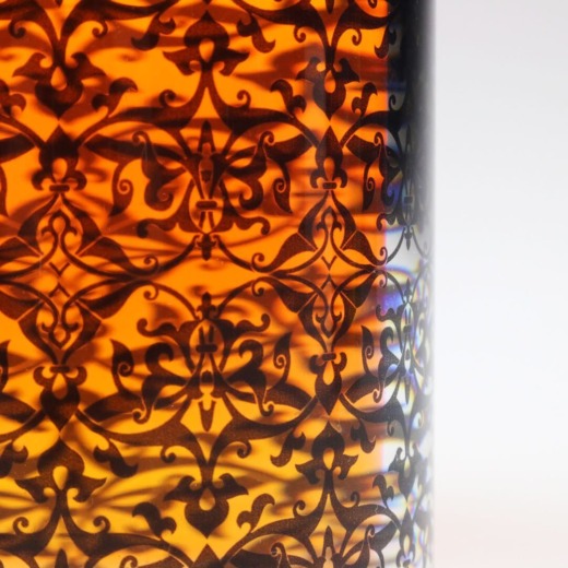 translucent brown acrylic with dark brown pattern printed on a cylinder for custom materials