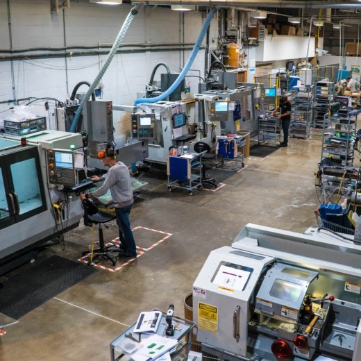 CNC workshop for acrylic fabrication with 6 CNC machines and two operators