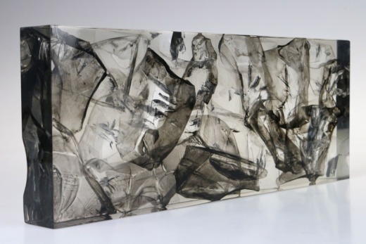 Translucent black acrylic bespoke lighting panel with shards and cracks embedded