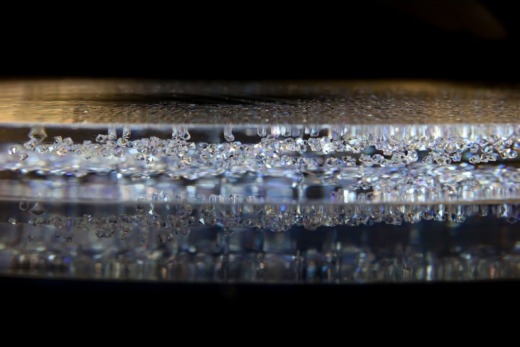 Clear acrylic with diamonds embedded on a layer for movie props