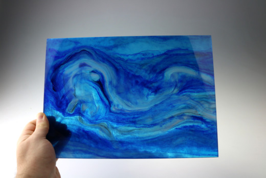 Acrylic swirl panel on a white background for custom materials