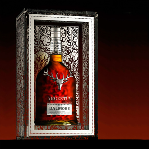 dalmore whisky bottle in a clear acrylic product display with silver screen printed pattern