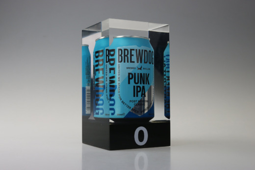 Brewdog IPA can encapsulated in clear acrylic with a black acrylic base and 0 printed in white on the black base for Brewdog product displays