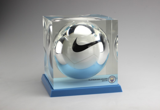 Manchester City football FC football product displays made from blue and clear acrylic with white and black football incased