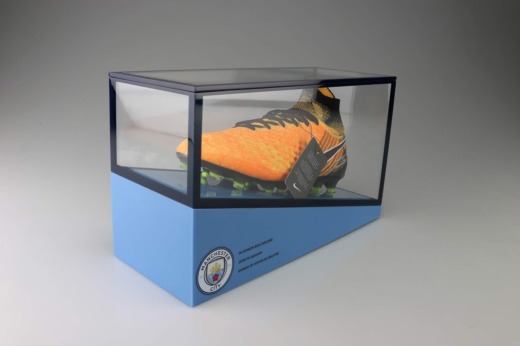 Manchester City football FC football boot product displays made from blue and clear acrylic with a Nike football boot incased