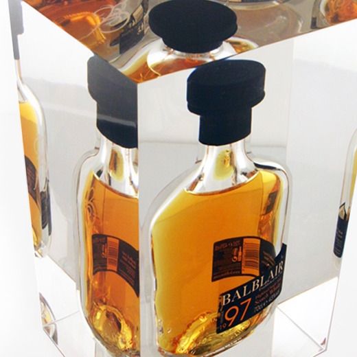 Balblair bottle glorifiers with Balblair bottles embedded in clear acrylic