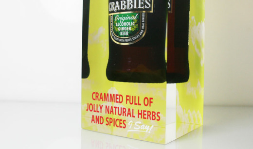 Crabbies Bottle glorifiers with a Crabbies Bottles embedded in clear acrylic with printed text on the front