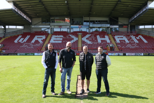 Midton and Wrexham AFC team collaborating on football memorabilia and fan gifting project