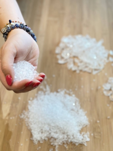 Recycled clear acrylic chips used in Midton Remade material production
