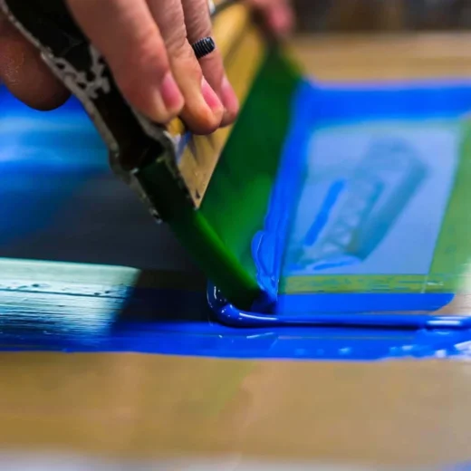 Screen printing branded corporate gifts during Midton production process