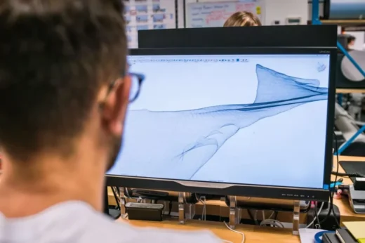 Designer working on CAD development for bespoke acrylic awards
