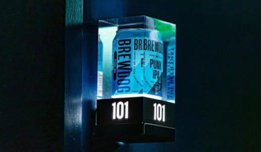 Beer can encapsulated inside clear cast acrylic illuminated display component