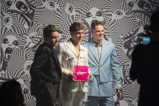 Event winners holding custom acrylic awards at Gay Times Honours ceremony