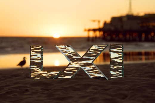 Acrylic Super Bowl LXI numerals at sunset on Santa Monica beach in Los Angeles