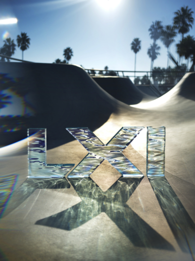 Bespoke acrylic Super Bowl LXI signage photographed at Venice Beach skatepark