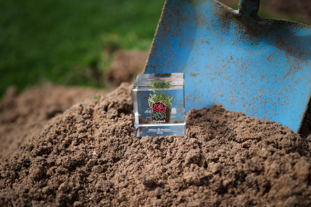 England Rugby memorabilia cube photographed during the Allianz Stadium pitch renovation using authentic turf preserved by Midton.
