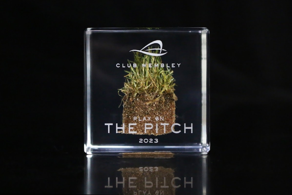 Club Wembley stadium pitch turf embedded in a clear acrylic memorabilia cube