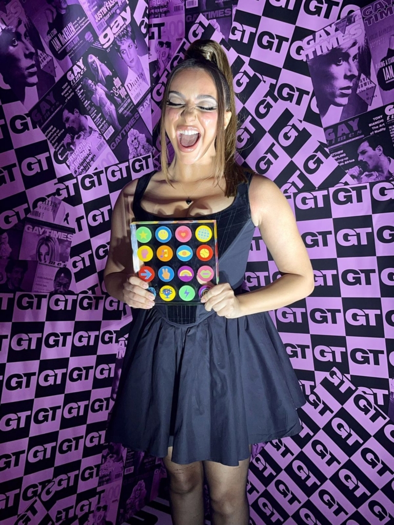 Jade Thirlwall holding the Gay Times Honours 2021 bespoke acrylic award